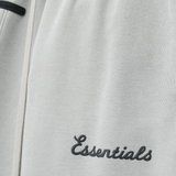 Close up of white pants, showing texture of the cotton fabric