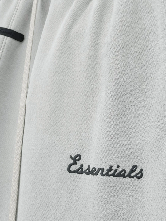 Close up of white pants, showing texture of the cotton fabric