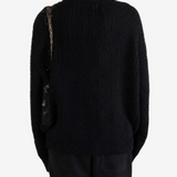 Black knitwear, full body view