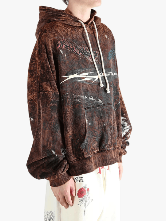 Brown hoodie worn by a person, showing the hoodie's fit