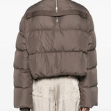 Brown jackets worn by a person, showing the jackets fit