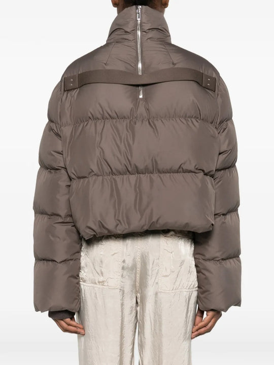 Brown jackets worn by a person, showing the jackets fit