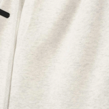 Close up of white pants, showing texture of the Cotton and Polyester fabric