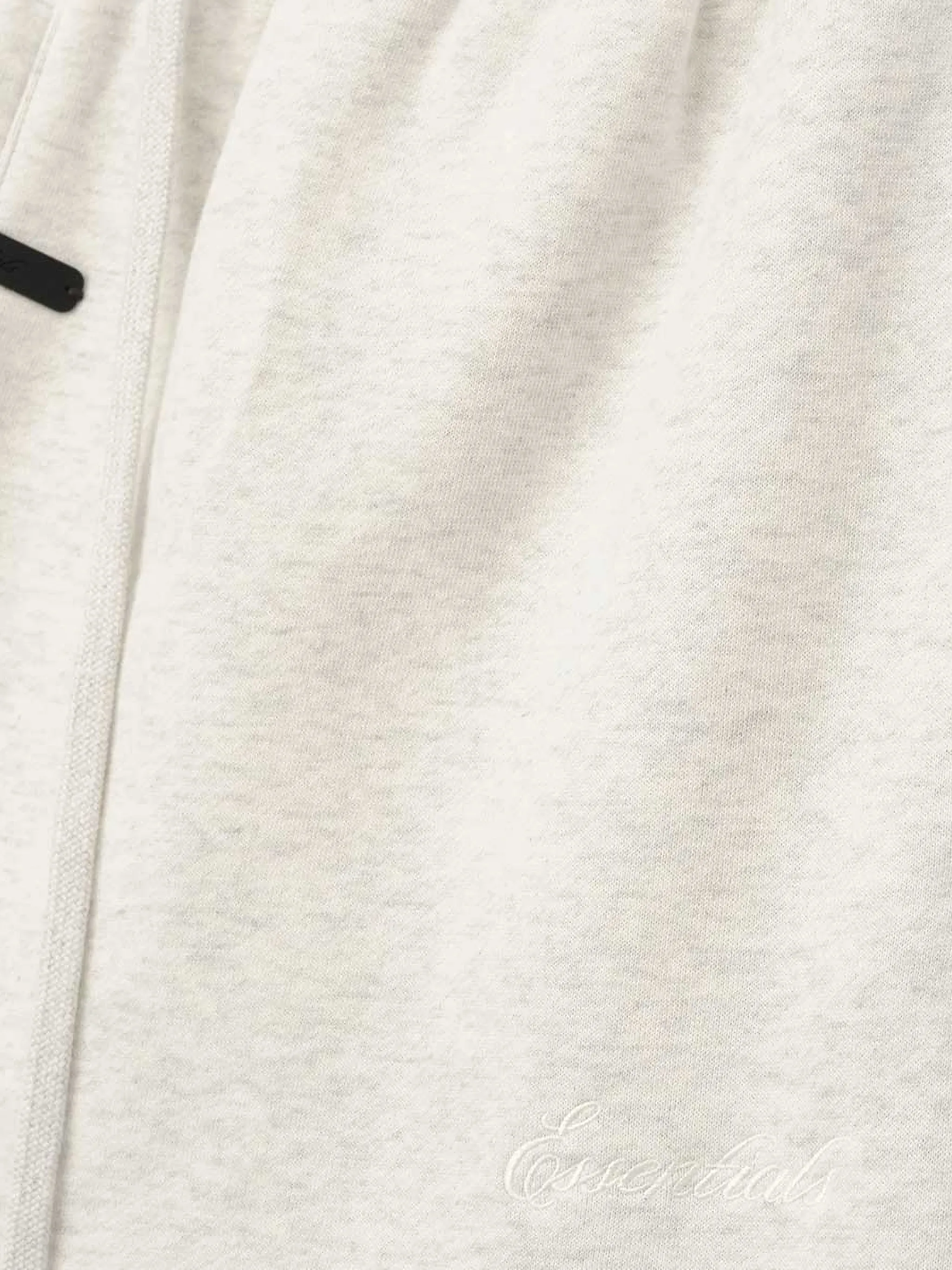 Close up of white pants, showing texture of the Cotton and Polyester fabric