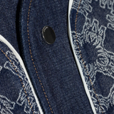 Close up of the blue shirt, showing texture of the cotton fabric