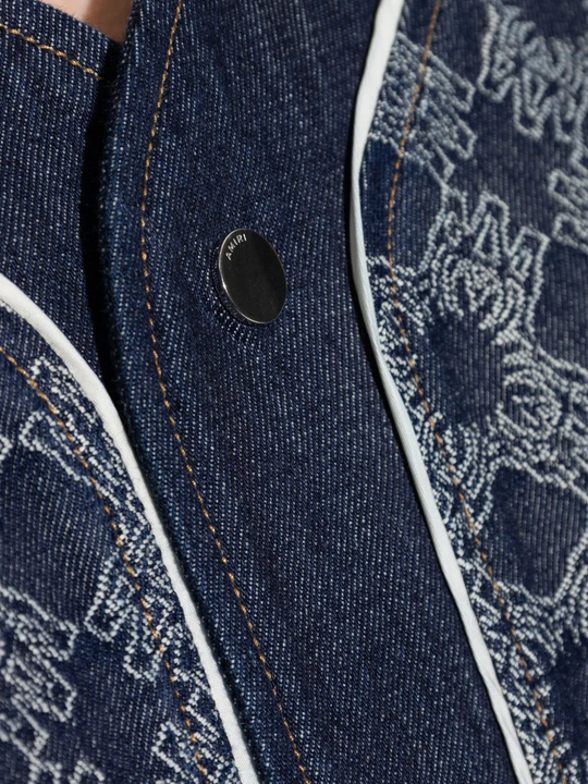 Close up of the blue shirt, showing texture of the cotton fabric