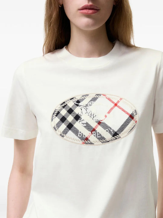 Tan t-shirt worn by a person, showing the t-shirt fit