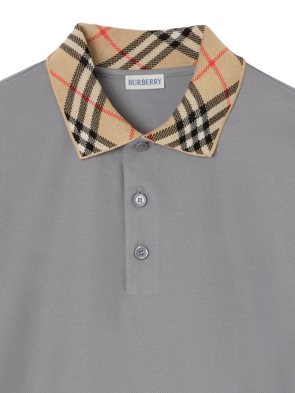 Close up of grey shirt, showing texture of the cotton fabric