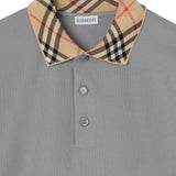 Close up of grey shirt, showing texture of the cotton fabric