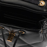 Close up of black bag, showing texture of the leather fabric