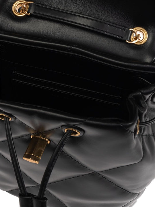 Close up of black bag, showing texture of the leather fabric