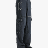 Black pants worn by a person, showing the pants' fit