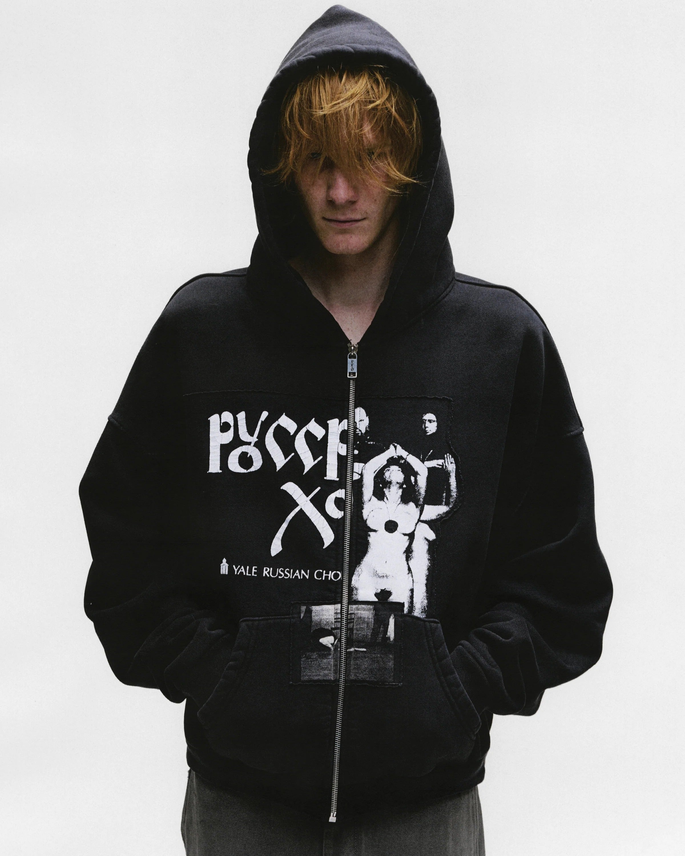 Black hoodies worn by a person, showing the hoodies fit