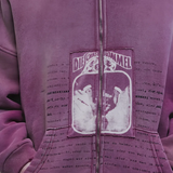 Purple hoodie worn by a person, showing the hoodie fit