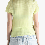 Yellow shirt worn by a person, showing the shirt's fit