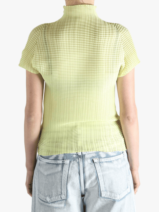 Yellow shirt worn by a person, showing the shirt's fit