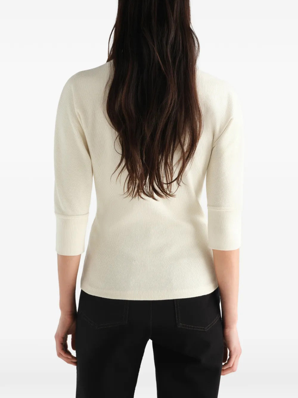 Tan t-shirt worn by a person, showing the t-shirt fit