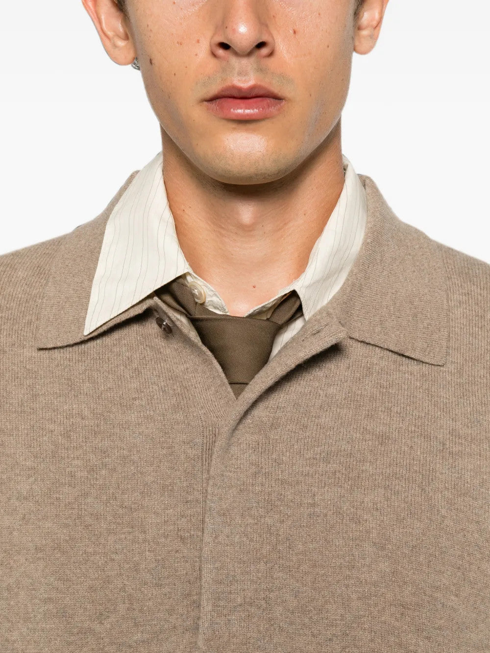 Tan top worn by a person, showing the top fit
