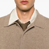 Tan top worn by a person, showing the top fit