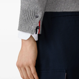 Close up of grey knitwear, showing texture of the Virgin Wool fabric