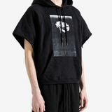 Black hoodie worn by a person, showing the hoodie fit