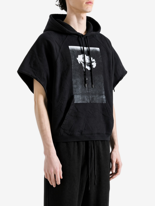 Black hoodie worn by a person, showing the hoodie fit