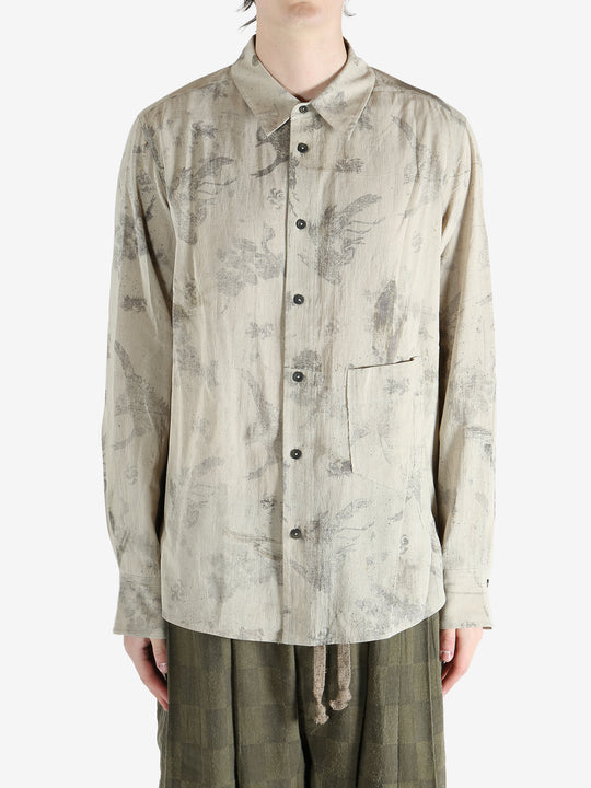 green shirts worn by a person, showing the shirts  fit