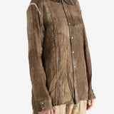 Brown shirt worn by a person, showing the shirt's fit