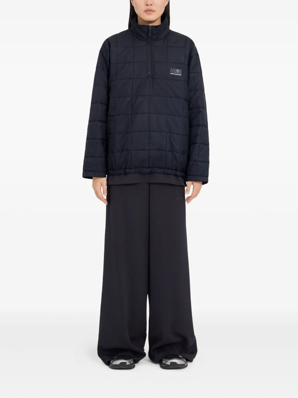 Blue jackets worn by a person, showing the jackets fit