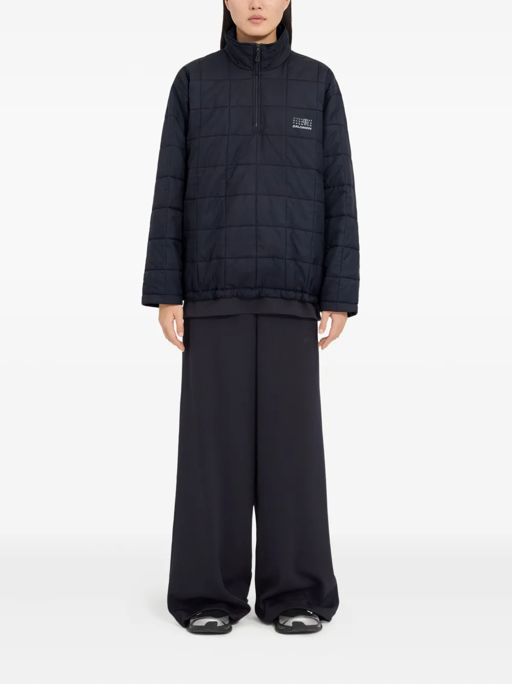 Blue jackets worn by a person, showing the jackets fit