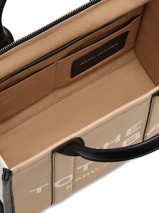 Close up of brown bag, showing texture of the leather fabric