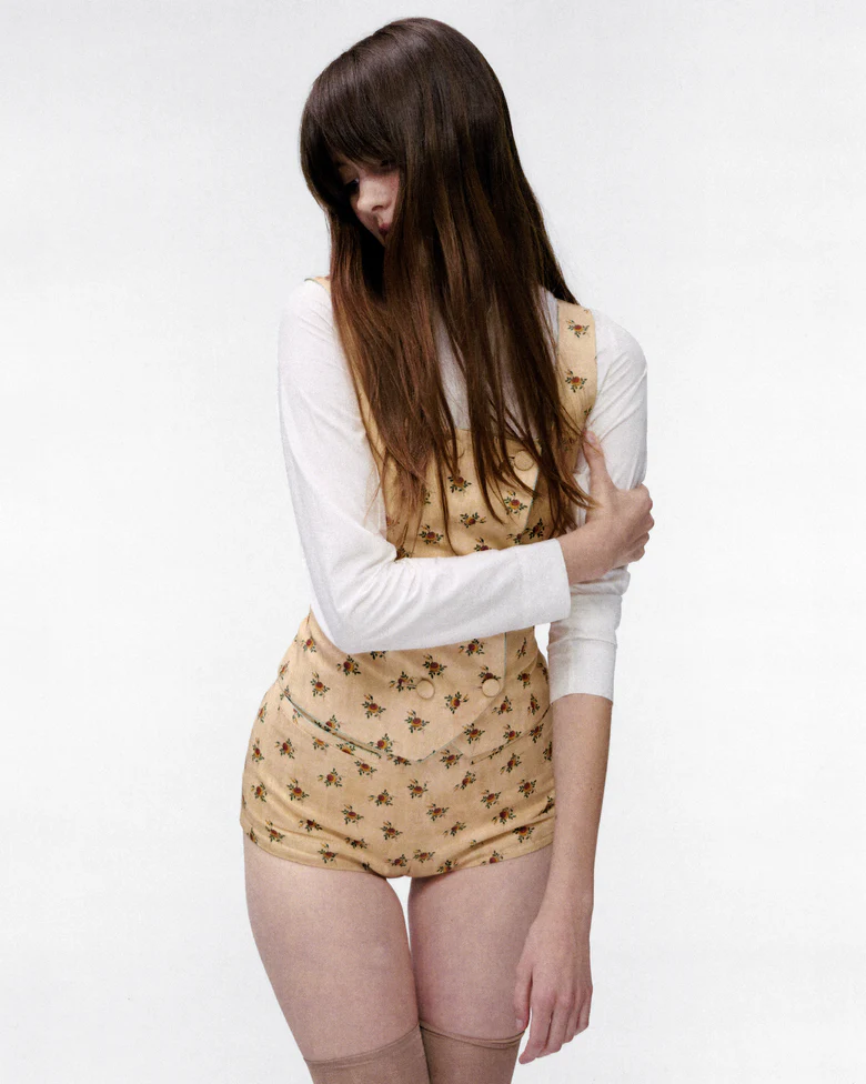 Tan jacket worn by a person, showing the jacket fit