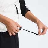 White top worn by a person, showing the top fit