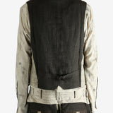 Green gilet worn by a person, showing the gilet's fit