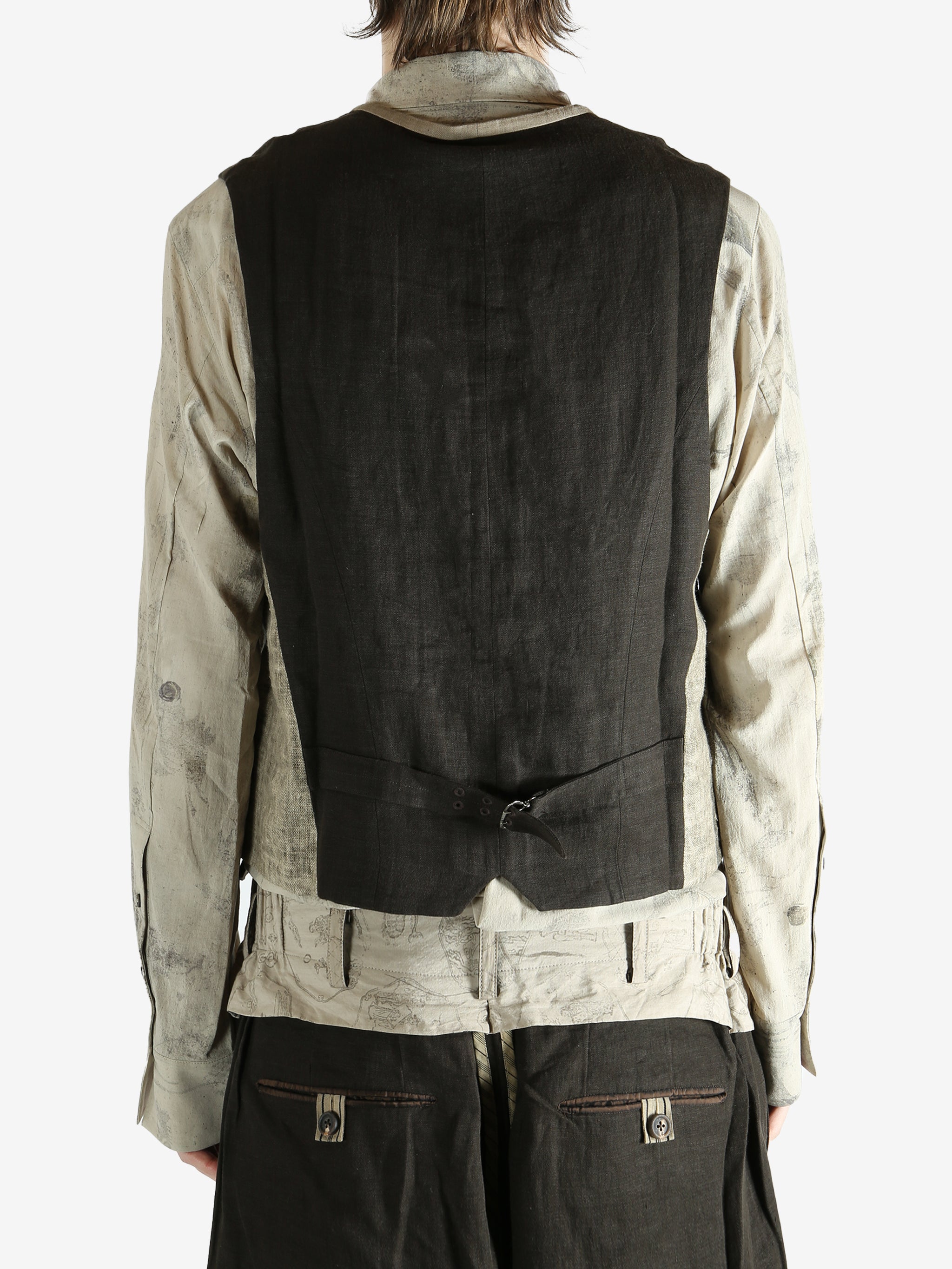 Green gilet worn by a person, showing the gilet's fit