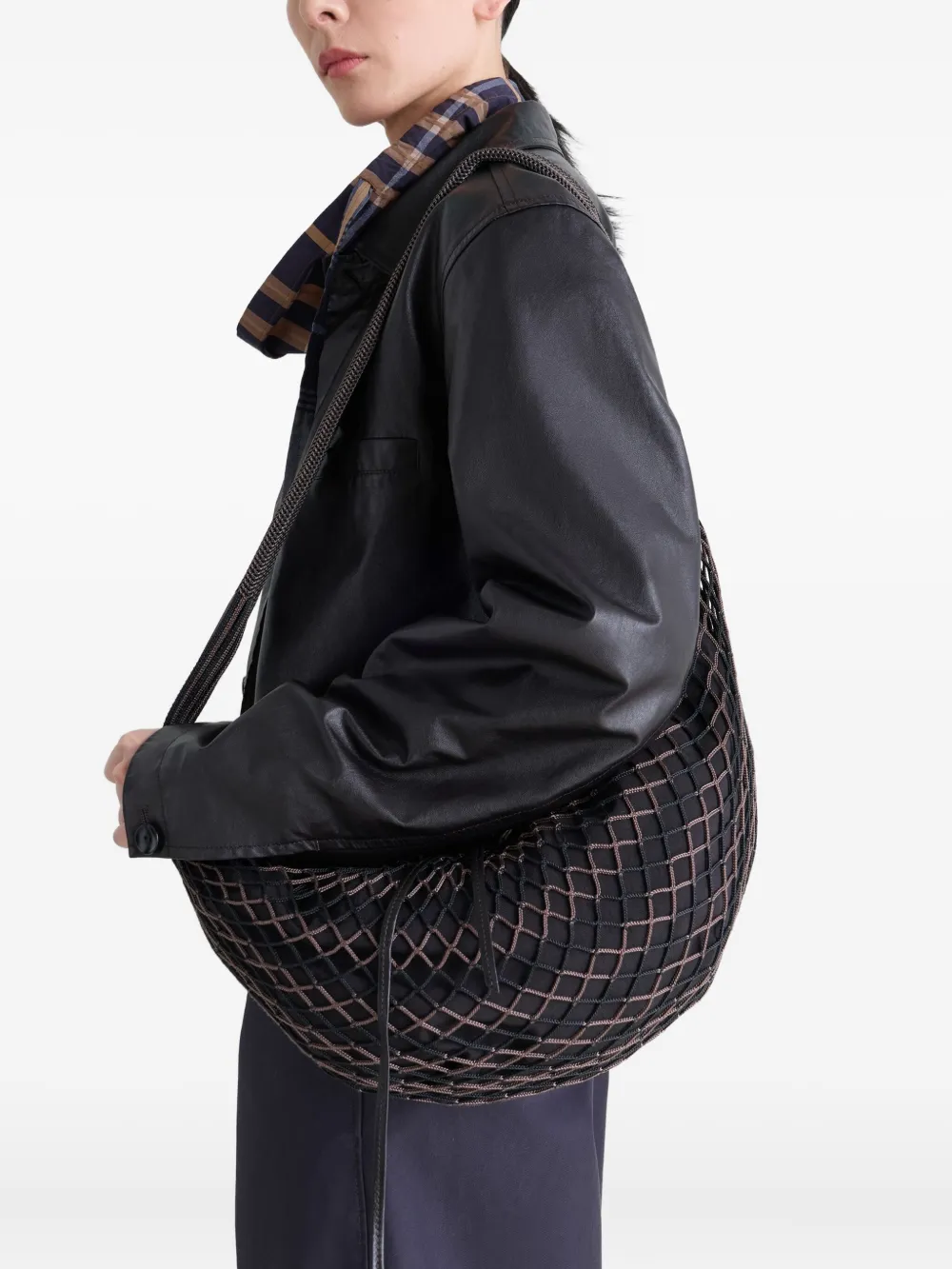 Black bag worn by a person, showing the bag's fit