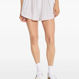 White short worn by a person, showing the short fit
