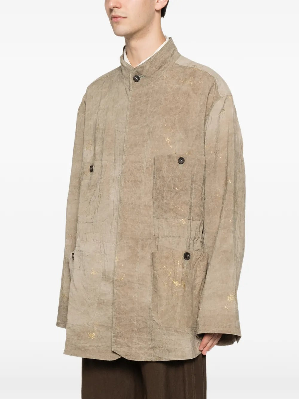 Tan jacket worn by a person, showing the jacket fit