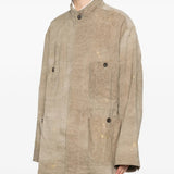 Tan jacket worn by a person, showing the jacket fit