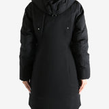 Black parka worn by a person, showing the parka fit