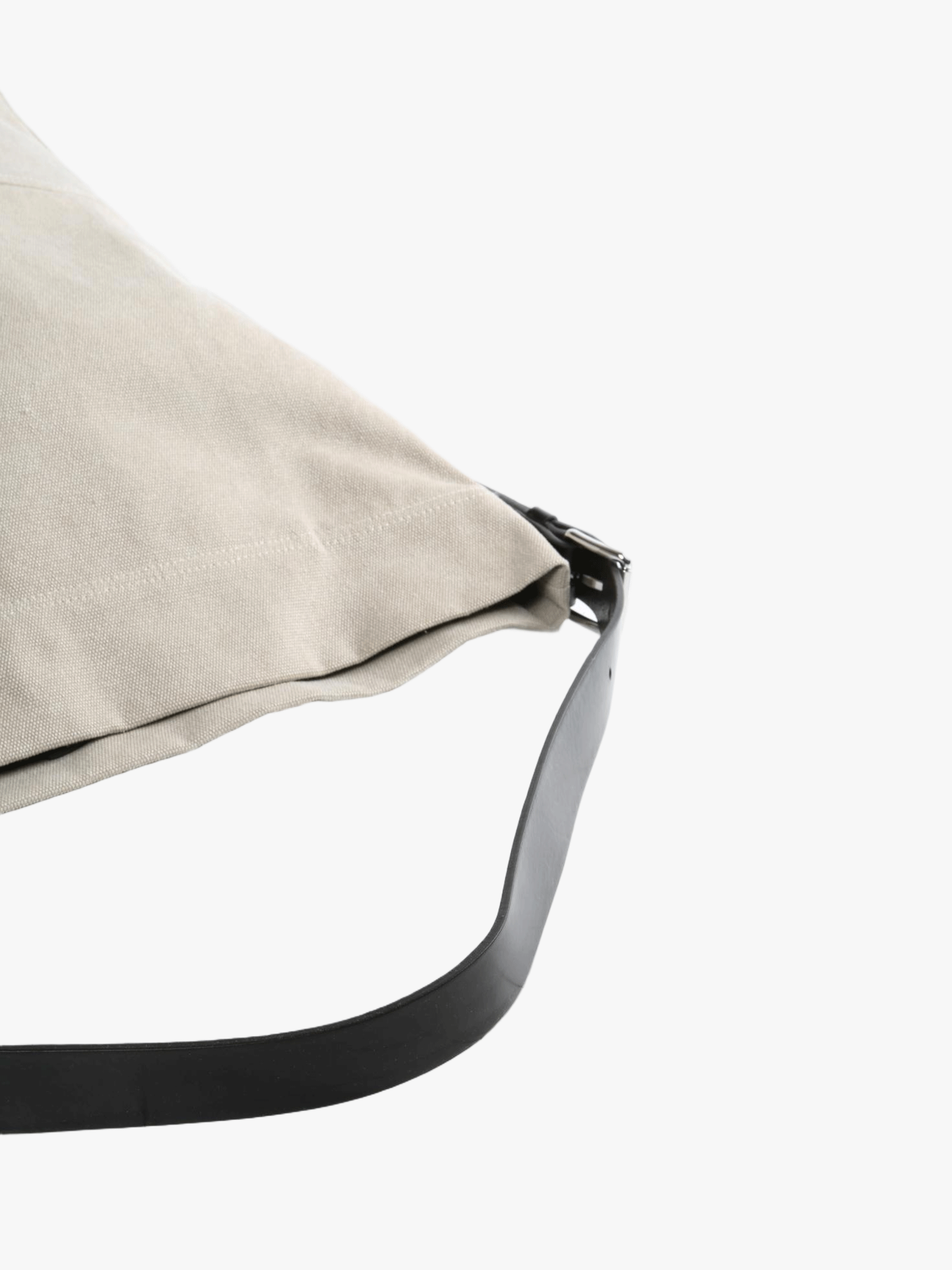 Close up of the grey bag, showing texture of the cotton fabric