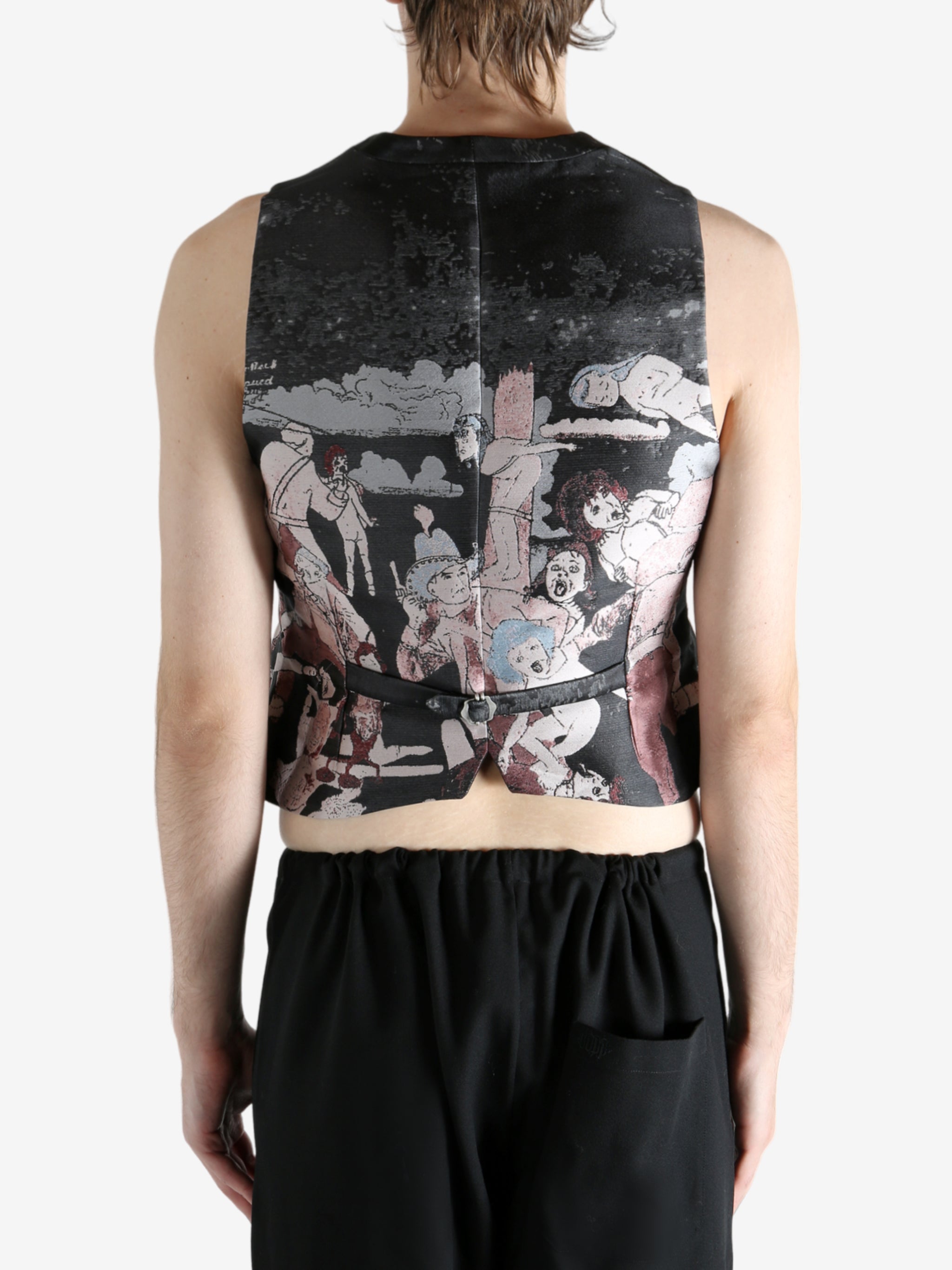 Black vest worn by a person, showing the vest fit