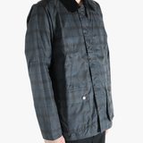 Blue jacket worn by a person, showing the jacket's fit