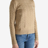 Tan pullover worn by a person, showing the pullover's fit