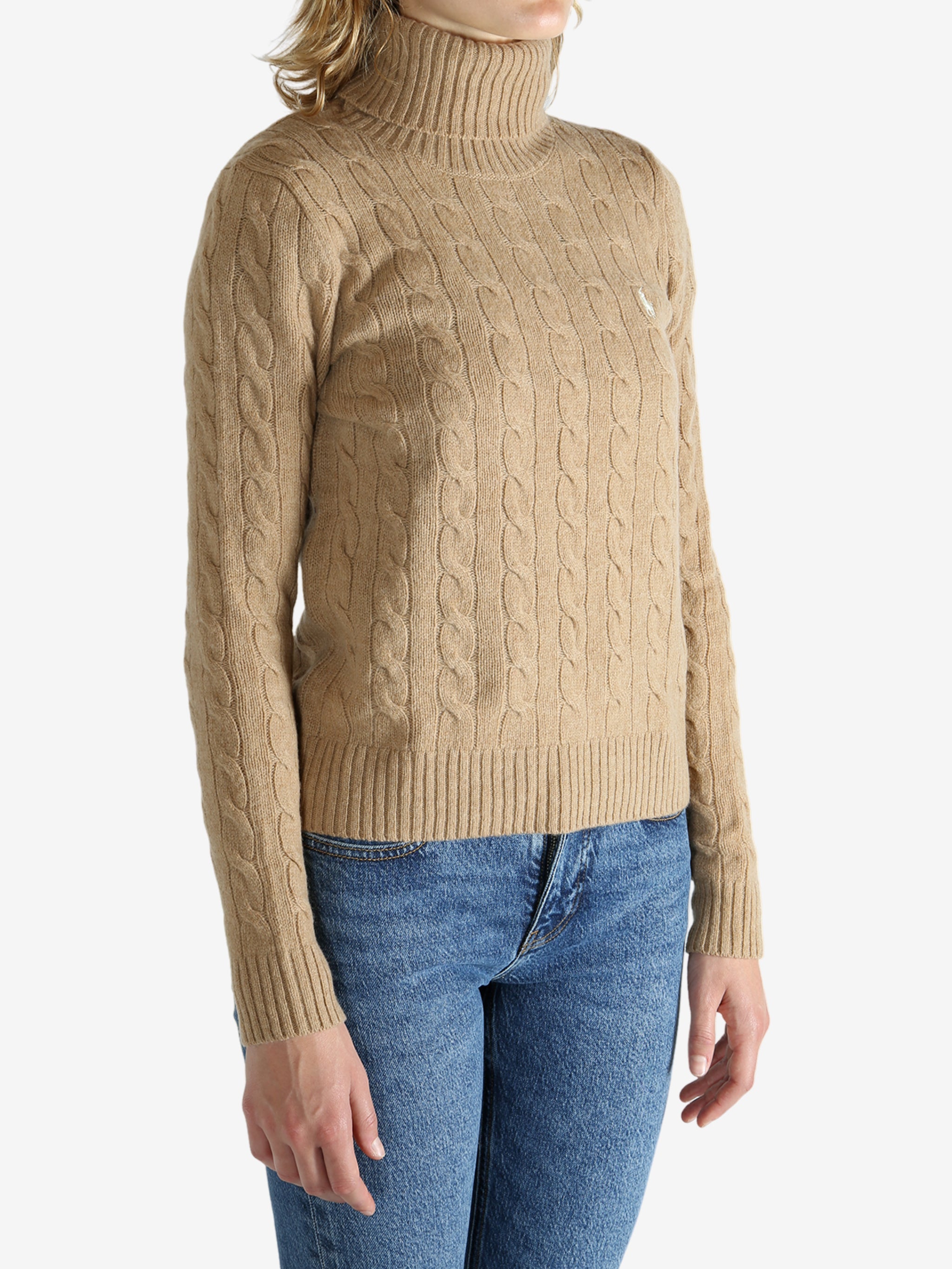 Tan pullover worn by a person, showing the pullover's fit