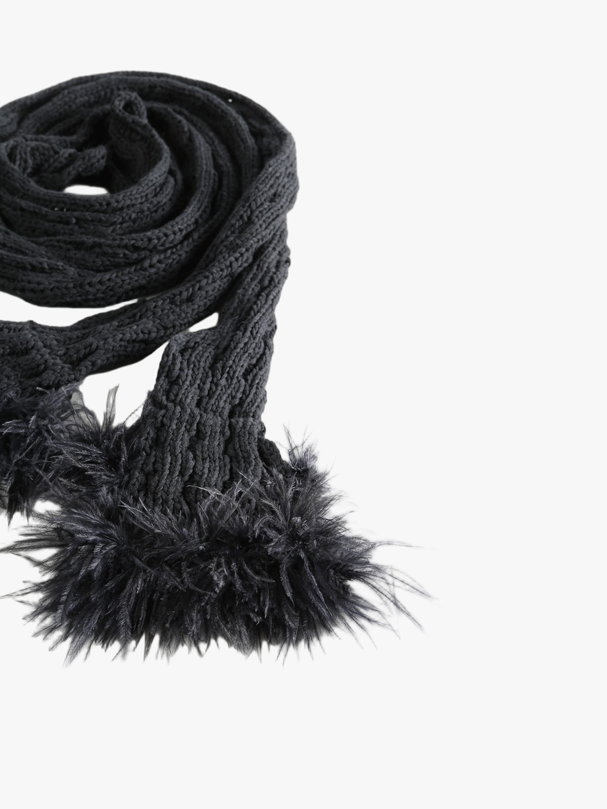 Close up of black scarves, showing texture of the cotton fabric