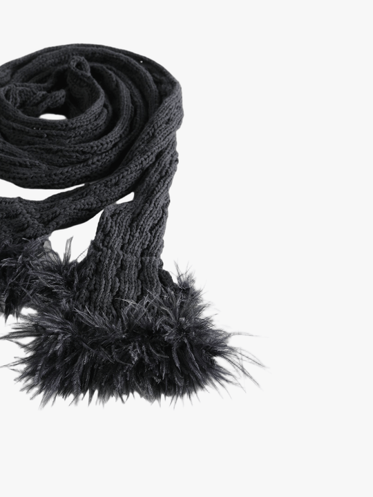 Close up of black scarves, showing texture of the cotton fabric