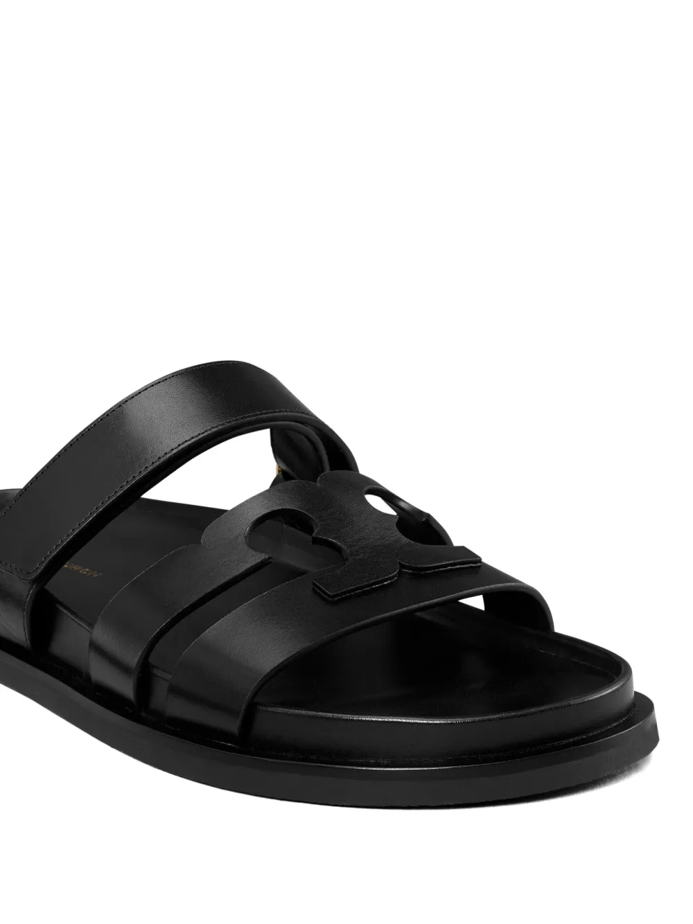 Close up of black sandals, showing texture of the blended fabric