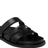 Close up of black sandals, showing texture of the blended fabric
