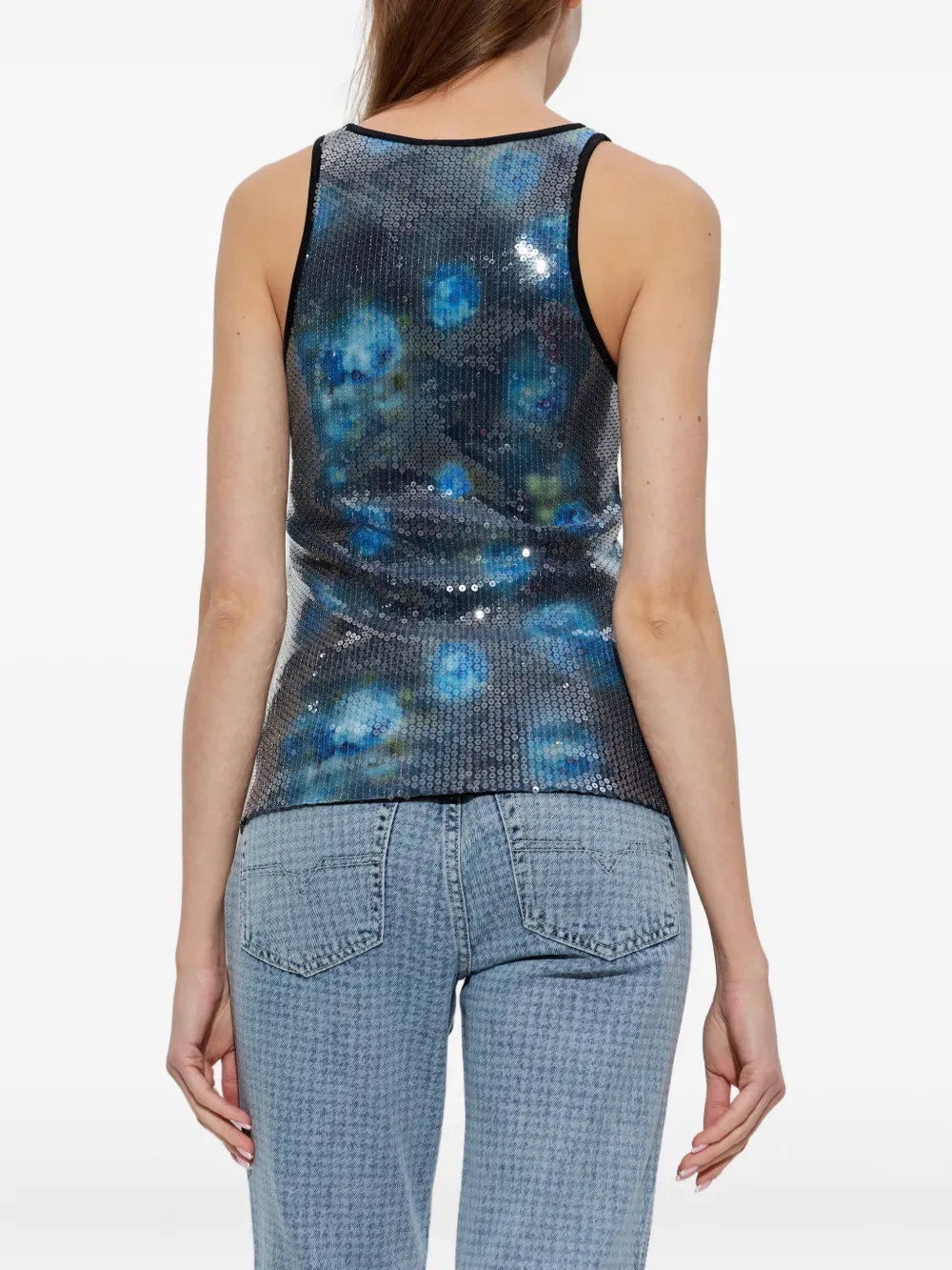 blue top worn by a person, showing the top fit